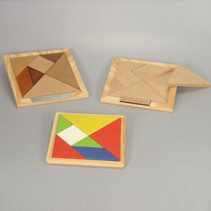  - JOGO TANGRAM EM MDF COM ACABAMENTOS NATURAL CRU, PINTADO OU TINGIDO ESCURECIDO. 